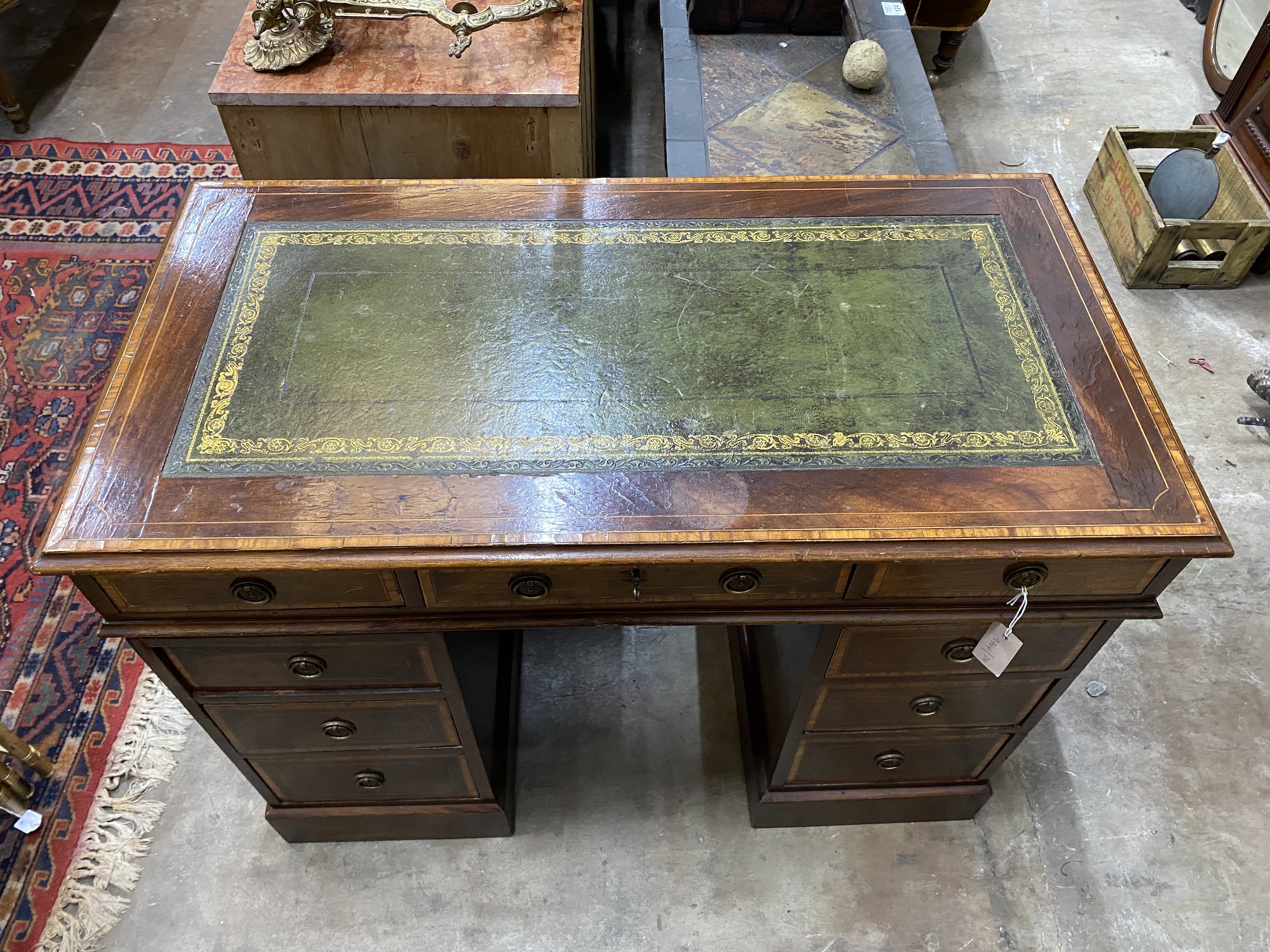 A 19th century and later satinwood banded mahogany pedestal desk, width 105cm, depth 55cm, height 76cm